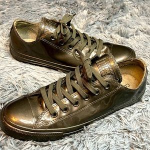 Low top Converse. Waterproof material black/dark gray color. Minimal wear.